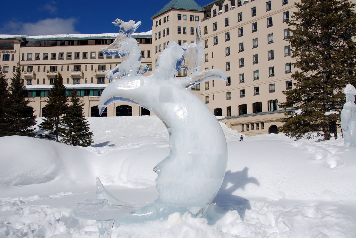 24C Moon Face Ice Sculpture With Chateau Lake Louise In Winter